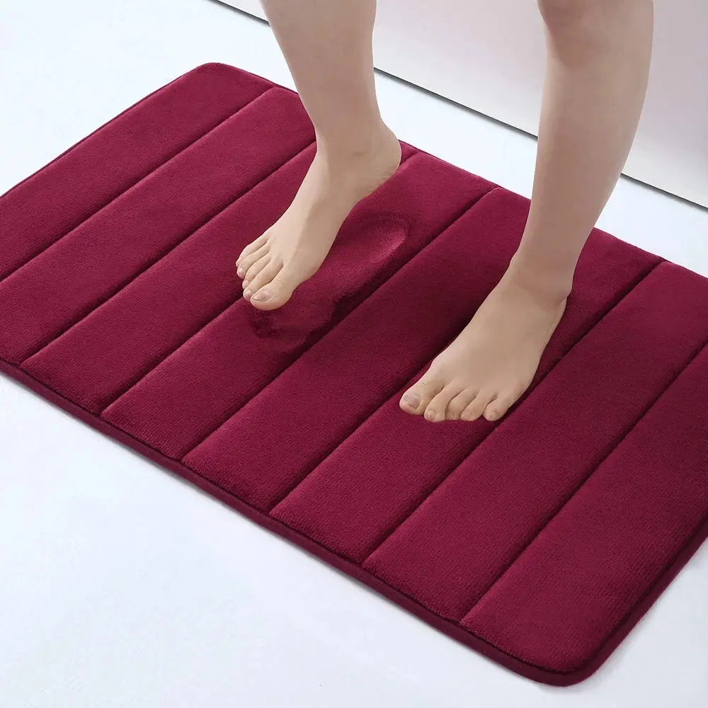 Tapis de bain Merci rouge bordeaux