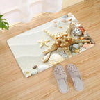 Tapis de bain coquillage gris